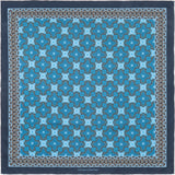 Flatlay of tile design silk pocket square in navy, turquoise and brown by Otway & Orford.