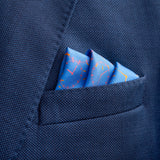 Chronos watch dial design silk pocket square in mid blue by Otway & Orford folded in top pocket
