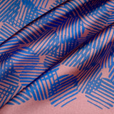 'Dot Dash' polka dot silk pocket square in pink with blue dots by Otway & Orford