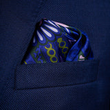 'Kaleidoscope' paisley silk pocket square in purple, green & pink by Otway & Orford folded in top pocket