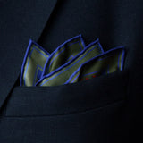 Whirligig medallion design silk pocket square in red by Otway & Orford folded in top pocket