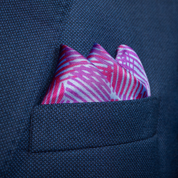Dots design silk pocket square in blue with mauve & pink by Otway & Orford in top pocket