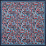 Paisley pattern silk pocket square in red and blue by Otway & Orford laid flat.