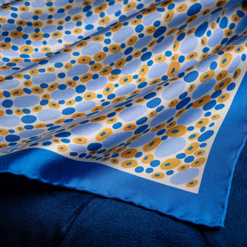 'Infinity' spots design silk pocket square in blue, gold & white by Otway & Orford