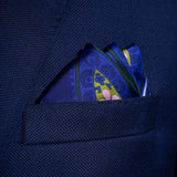 'Kaleidoscope' paisley silk pocket square in purple, green & pink by Otway & Orford folded in top pocket