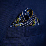 Labyrinth paisley silk pocket square in blue and white with lime green and orange by Otway & Orford folded in top pocket