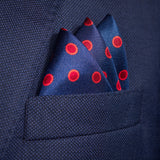Luna polka dot silk pocket in blue with red dots by Otway & Orford folded in top pocket