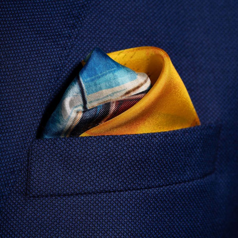 1960s American muscle car silk pocket square in blue & orange by Otway & Orford folded in top pocket