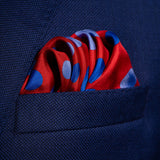 'Planetarium' polka dot silk pocket square in red with blue dots by Otway & Orford folded in top pocket