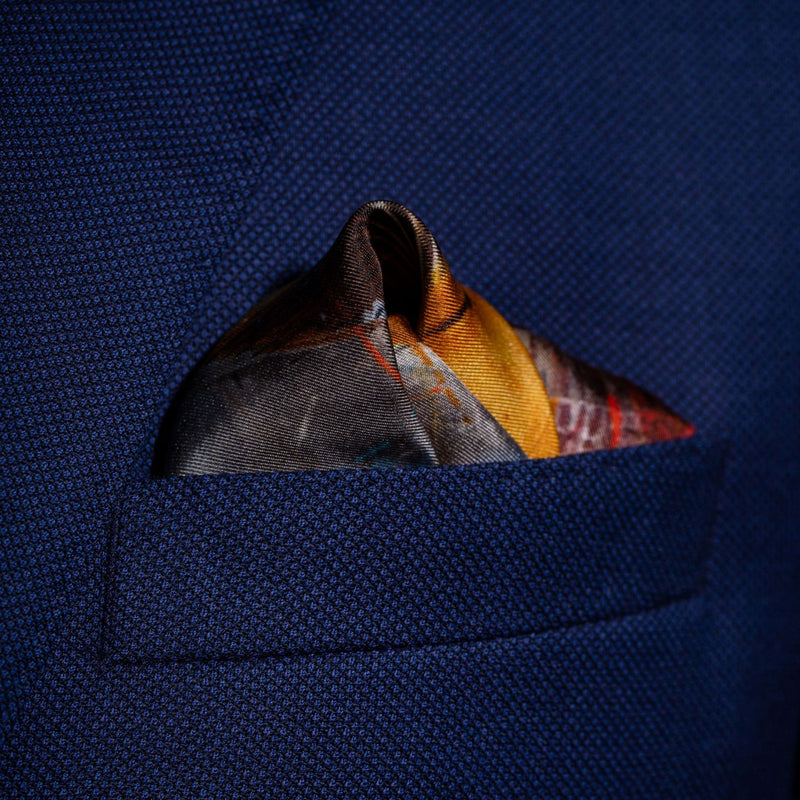 Classic sports cars inspired silk pocket square in red, yellow and blue by Otway & Orford folded in top pocket