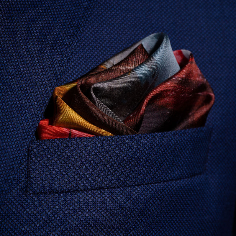 Classic sports cars inspired silk pocket square in red, yellow and blue by Otway & Orford folded in top pocket