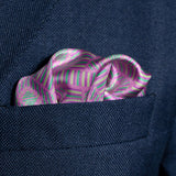 Squares design silk pocket square in deep pink with blue, mauve & green by Otway & Orford folded in top pocket