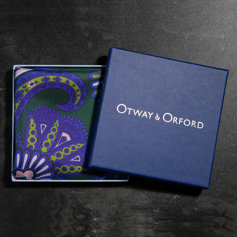'Kaleidoscope' paisley silk pocket square in purple, green & pink by Otway & Orford folded in gift box