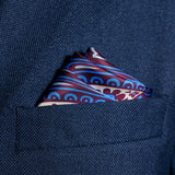 Paisley design silk pocket square in blue, burgundy & cream by Otway & Orford folded in top pocket