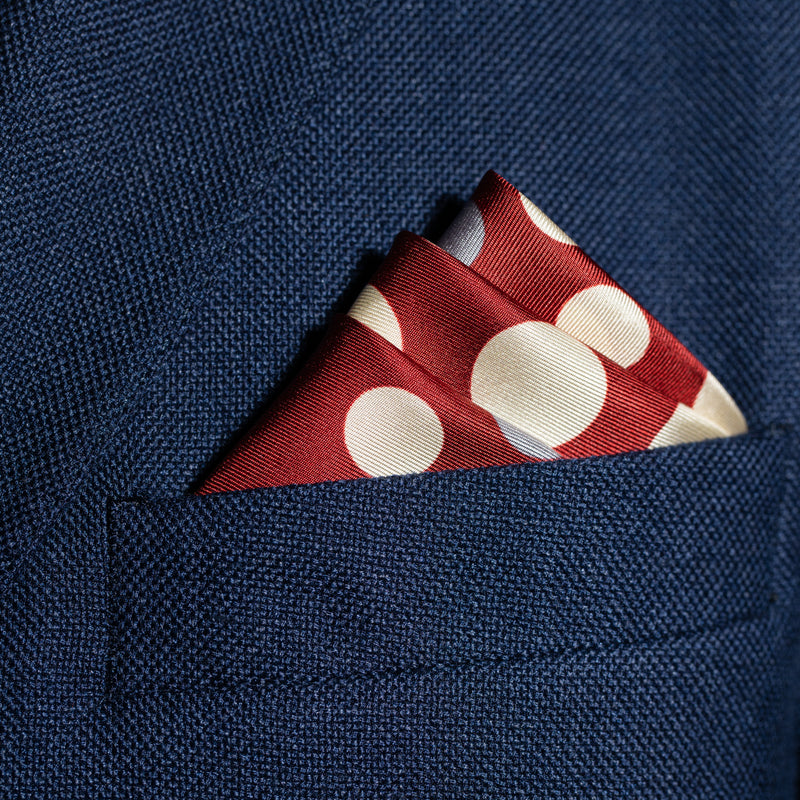 Polka dots design silk pocket square in maroon with grey and cream by Otway & Orford folded in top pocket
