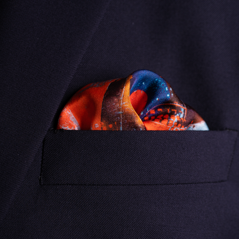 Spitfire silk pocket square in orange by Otway & Orford folded 1